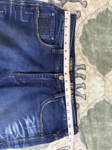 Combo of Black shirt and blue jeans