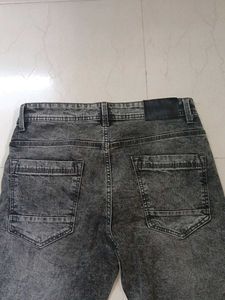 Ripped Gray Wash Jeans
