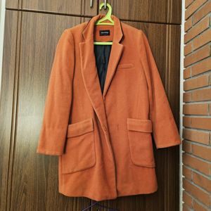 orange statement coat 🧥