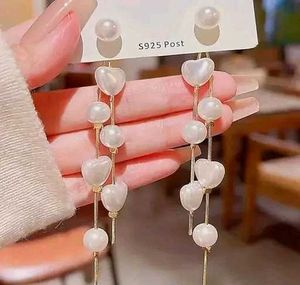 YUG&#39;S Heart And Pearl Long Tassel Trendy Earrings