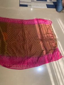 Lovely brown and pink bandhej sari