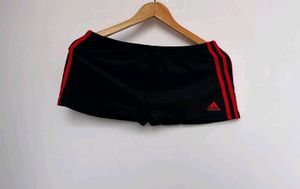 Adidas black three striped red mini shorts