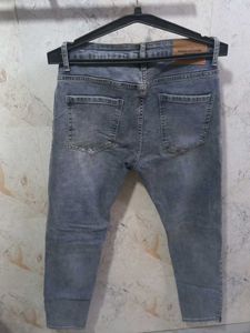 Ripped Gray Wash Jeans