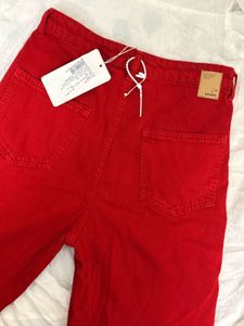 Red solid boot cut / straight Jeans