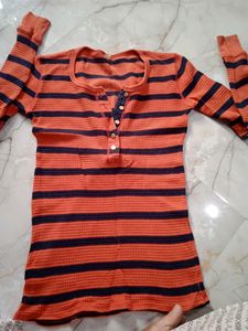orange pretty top.