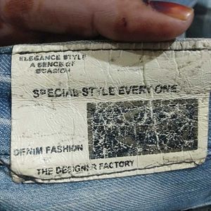 Embroidered Light Wash Denim Jeans