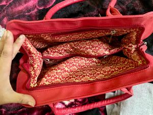 Pure Leather Red Handbag