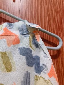 sleeveless dress with matching Purse