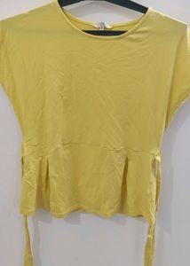 AND Yellow Back Tie Peplum Top