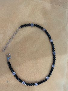 Elegant Black Beaded Anklet with Floral Charm