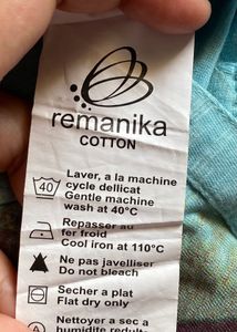 Remanika Blue Graphic T-Shirt – Size XS (with tag)