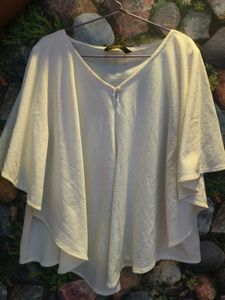 A Flaired Off White Top.