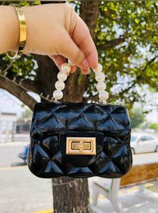 Quilted Pearl Handle Mini Bag