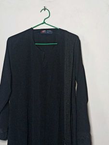 black abaya with detailing on the sides | women