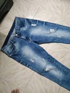 Distressed Denim Jeans
