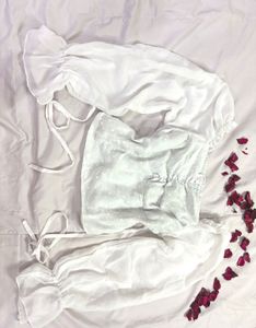 Sheer Sleeve Polka Dot White Top. NEW WITHOUT TAG.