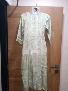 Pastel Green Embroidered Kurti.