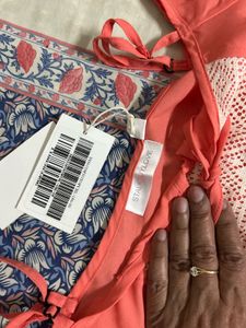 brand new Coral Flutter Sleeve Top