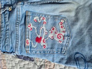 Wide Leg Jeans with Bow Detail