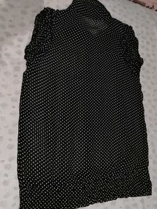 A Black Shirt With White Polka Dot