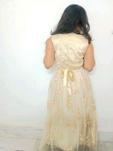 Elegant Champagne Gold Floral Net Gown – Perfect f