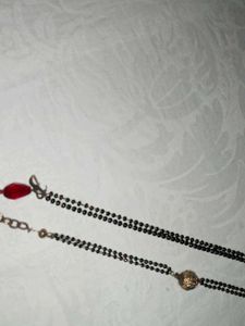 hand .Mangalsutra Chains