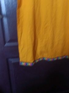 Yellow Kurti with Colorful Trim