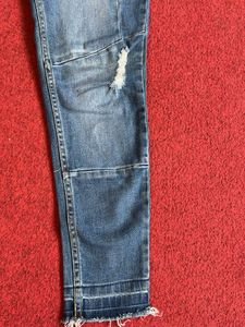 Distressed Denim Jeans