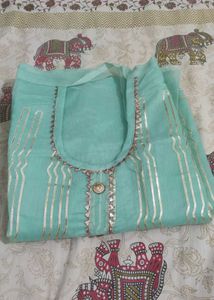 Unstitched Aqua Salwar Kameez Set
