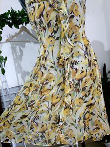 Yellow Ruffled Printed Knee Length Dress
