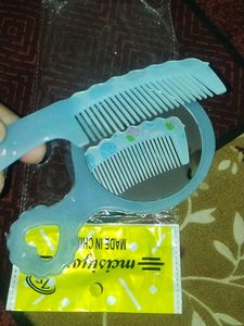 Small Mirror And Comb