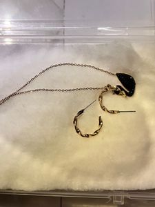 Gold Tone Bow Pendant Necklace