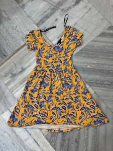 Forever 21. Floral Yellow Back Criss Cross  Dress