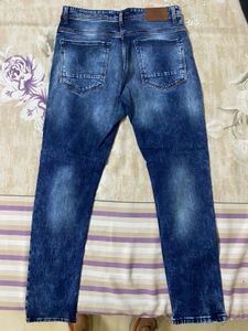 Distressed Denim Jeans with Patches