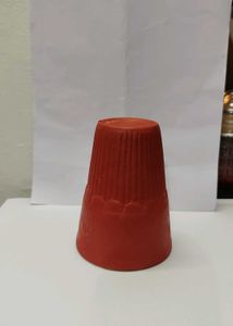 One Palm Size mud Tumbler