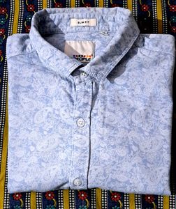 Branded printed leaf print shirt.