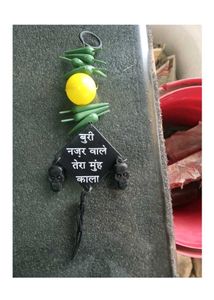 Evil Eye Wall Hanging with Lemons and Chillies