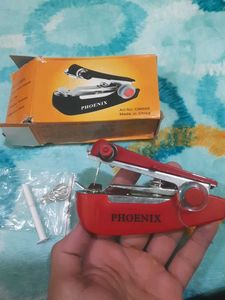 mini handheld sewing machine