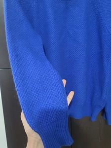 Branded Almost new -Blue Self design Sweater.