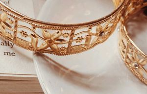 Elegant Floral Gold-Toned Bangles (Set of 2)