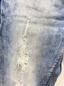 Ripped Blue Denim Jeans