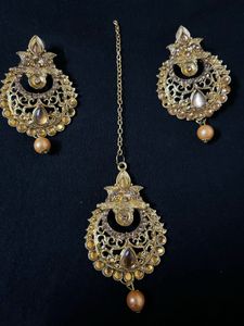 Tika with earrings