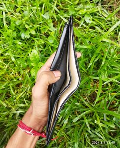 ₹30/- Off Unused Black Wallet