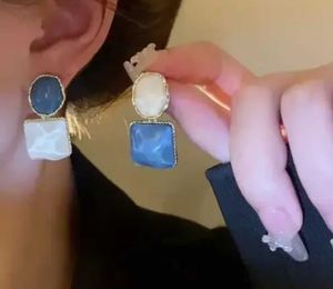 Stylish Blue &amp; White Earrings