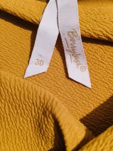 Mustard Knot Mini Skirt