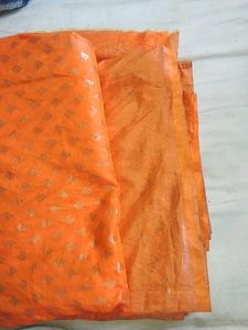 Orange Saree with Silver Detail