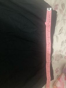 Different Coloured Leggings And One White Palazzo