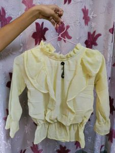 Chic Yellow Ruffle Front top | Swiss Dot Sheer Lon
