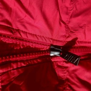 A Red Colour Nike Puffer Jacket