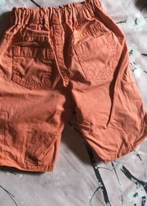 Two Boys Orange and green Shorts